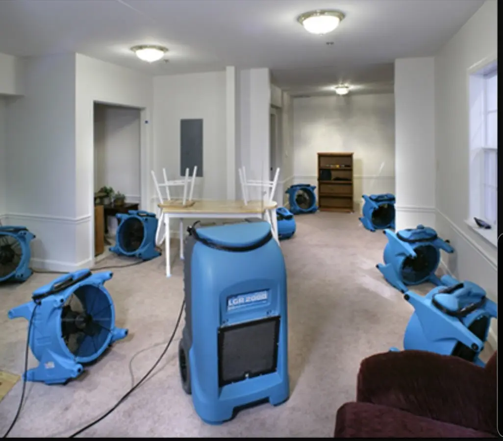 Air movers and dehumidifier setup for Water Damage Restoration in Astoria